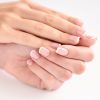 Beautiful woman hands with french manicure